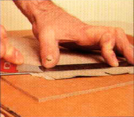 Stages of veneer paneling with fringing